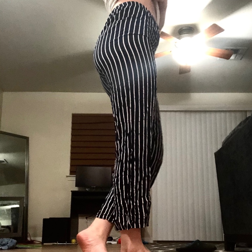 Black and white striped pants.